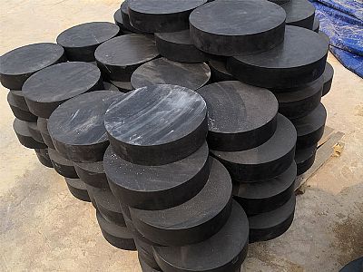 长治板式橡胶支座由若干层橡胶片与薄钢板经加压硫化